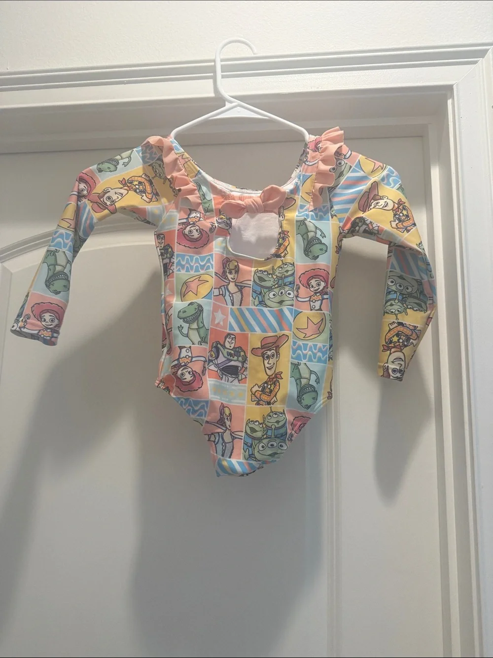 Disney Kids One-Piece Bodysuit in Pastel Multi-Color Toy Story Print